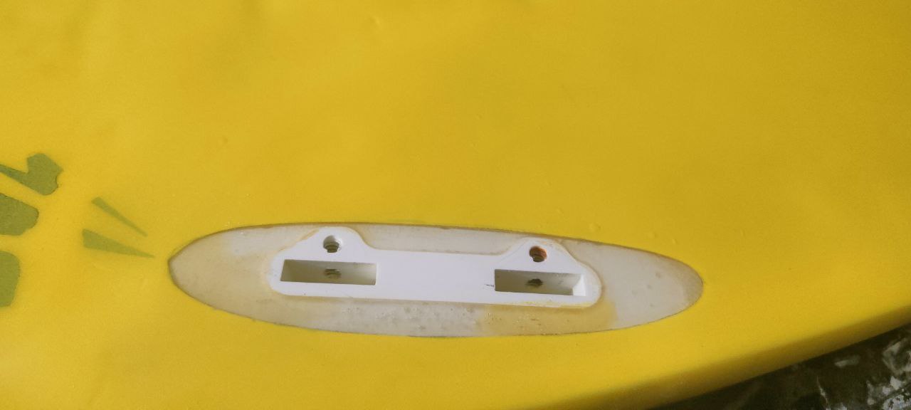 Surfboard fin box